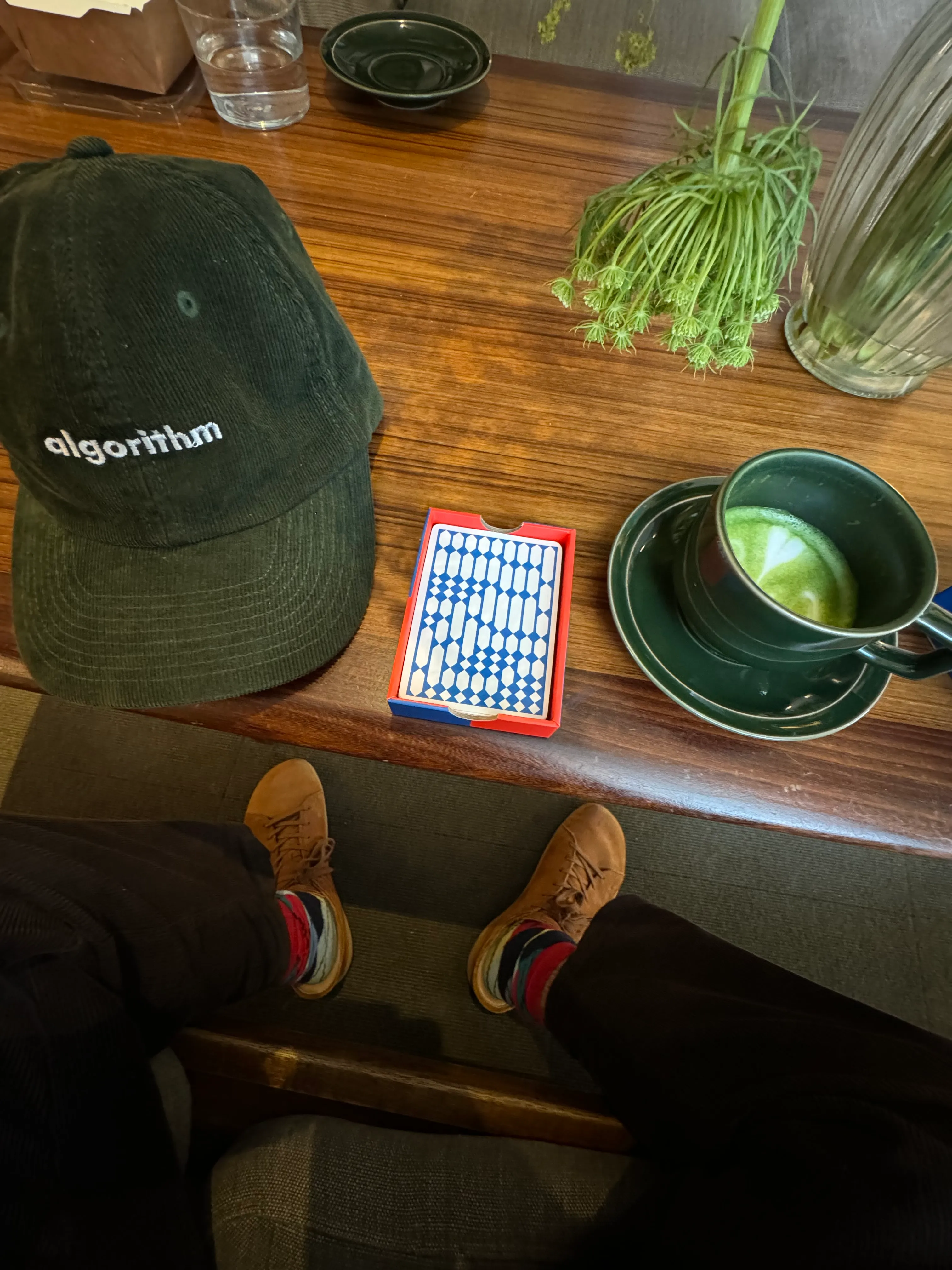 Someone using Algodeck inside a coffee shop while taking a break.